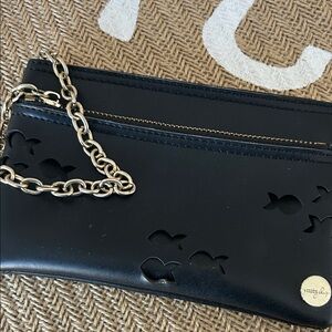 Pretty Ships Black wrist lid with cut out fish and Gold Chain wrist pull